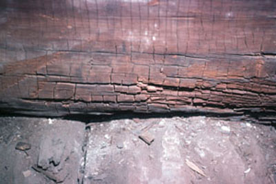 Decayed lower wood wall